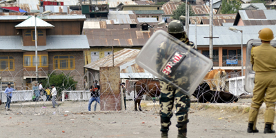 Journalists attacked by protesters as curfew lifted in Kashmir
